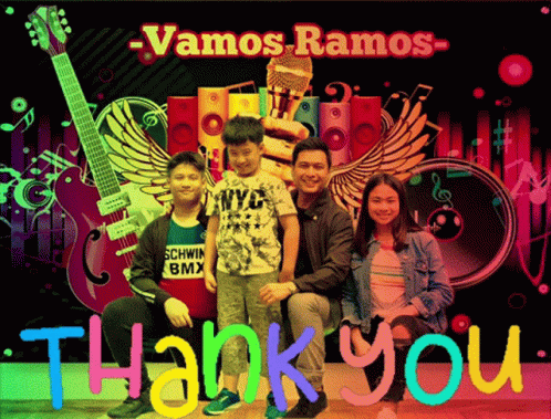 Family Posing in Front of Vamos Ramos Poster