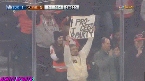 Fan Holds Sign Saying Pro-Ceed Party
