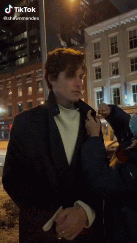 Fan Signing Man in Suit