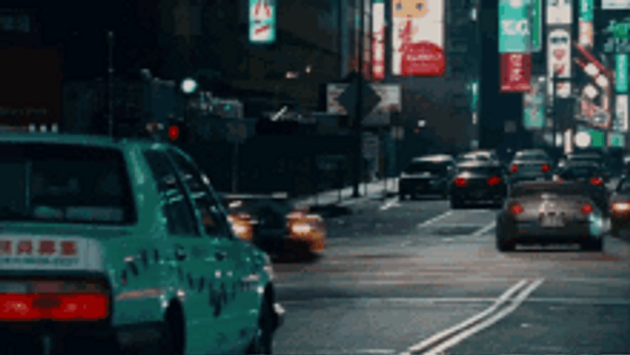 Fast Car Drifting On Busy Street GIF