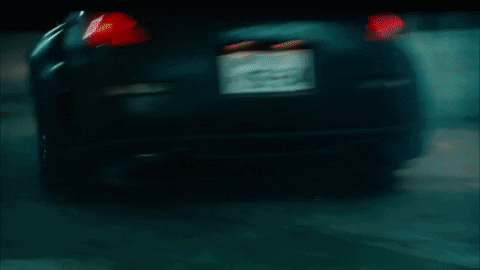 Fast Car Rushing To A Parking Lot GIF