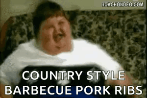 Fat Man Eating Barbecue Ribs Making Funny Face