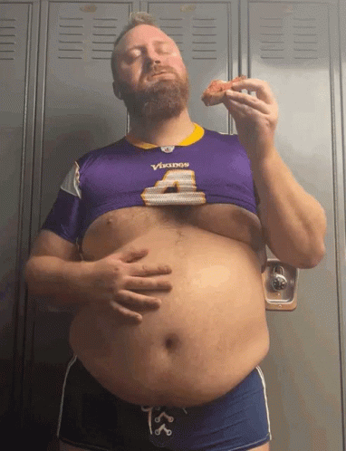 Fat Man Holds His Bely Eating GIF
