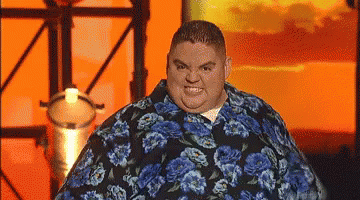 Fat Man in Blue Floral Shirt Making Funny Face
