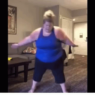 Fat Woman Dancing in Living Room