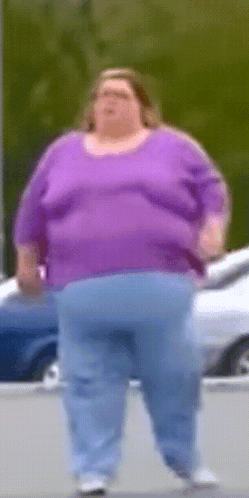 Fat Woman in Purple Shirt and Blue Jeans