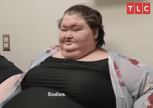 Fat Woman Says Sodies In Front of TLC Sign