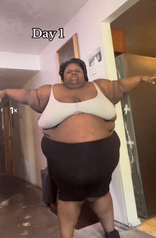 Fat Woman Standing with Arms Outstretched