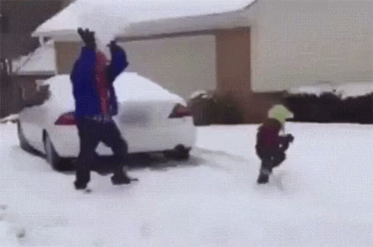 Father And Son Enjoying Happy Snow Day GIF