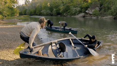 Father And Son On Canoe GIF