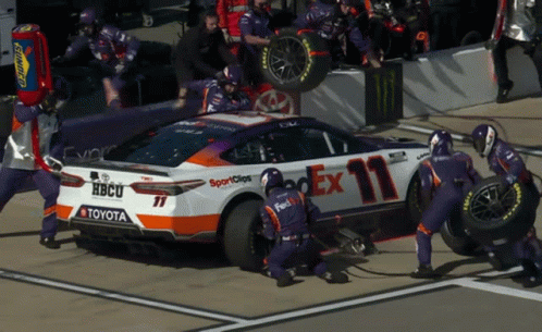 FedEx Race Car Worked On By Mechanics