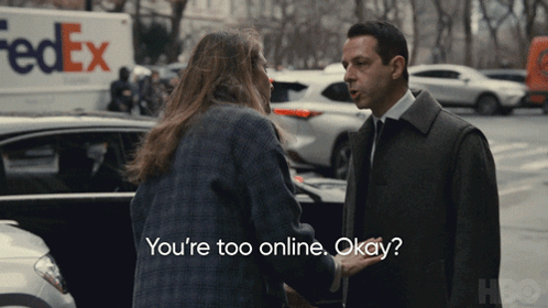 FedEx Truck Behind Man And Woman GIF