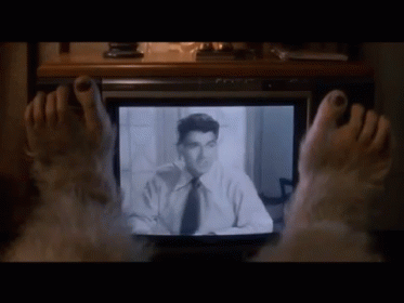 Feet On TV Watching Man GIF