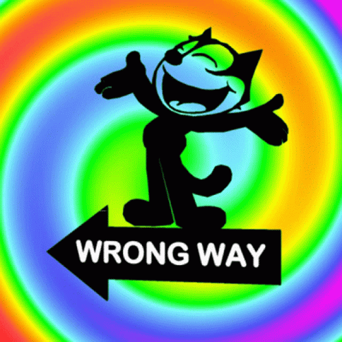 Felix The Cat With A Rainbow Background And A Sign That Says Wrong Way GIF
