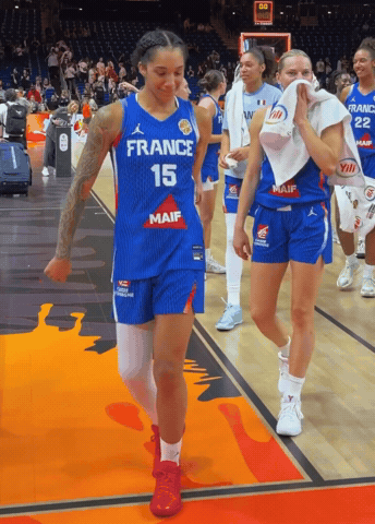 Female Basketball Player In France 15 Jersey Walking Off Court GIF