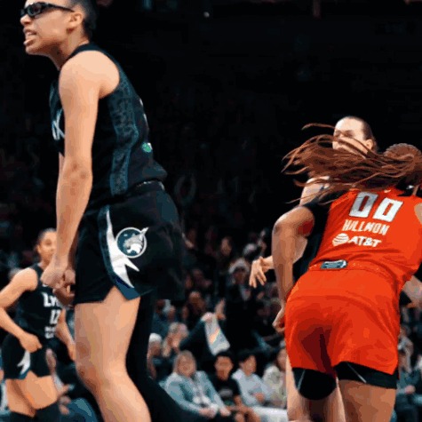 Female Basketball Player In Red Jersey Number 00 GIF