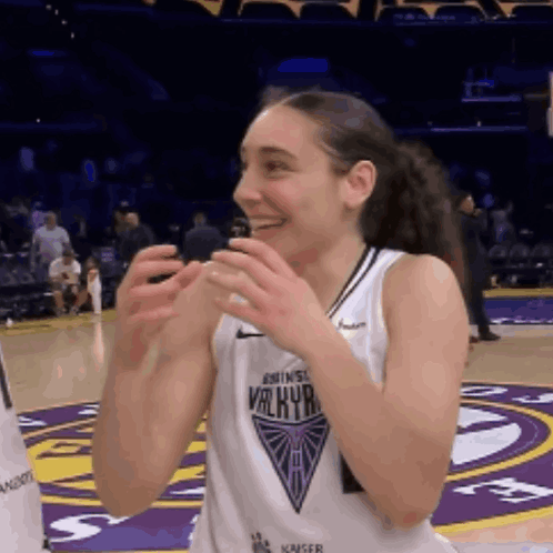 Female Basketball Player in White Valkyrie Jersey