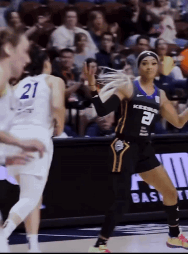 Female Basketball Player Number 21 GIF