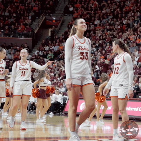 Female Basketball Player Number 33 Walking on Court
