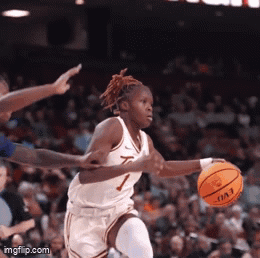 Female Basketball Player Number 7 Dribbling