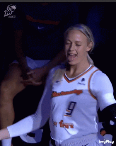 Female Basketball Player Number 9 Sticking Tongue Out GIF