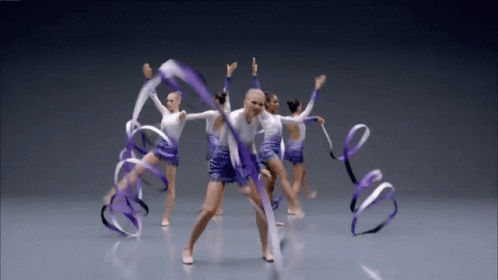 Female Gymnasts Dancing With Ribbons