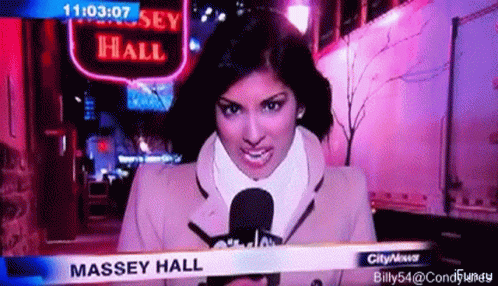 Female News Anchor Holding Microphone In Front Of Massey Hall Sign GIF
