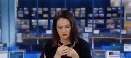 Female Reporter Reaction After Being Caught GIF