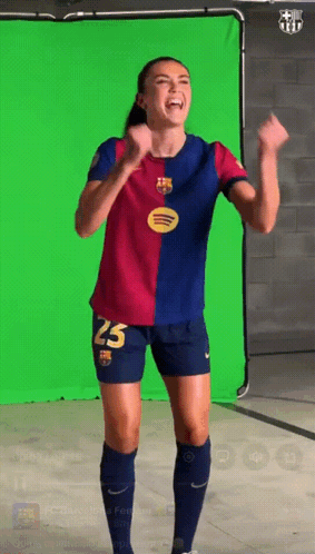 Female Soccer Player Celebrates Number 25