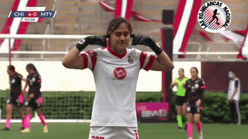 Female Soccer Player Covering Ears GIF