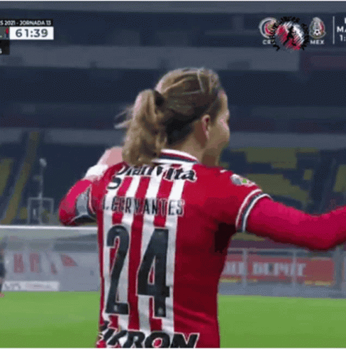 Female Soccer Player in Red and White Jersey