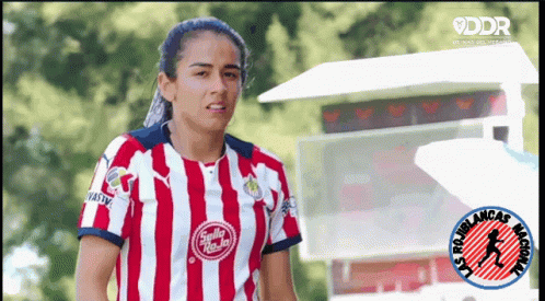 Female Soccer Player In Red And White Stripes GIF
