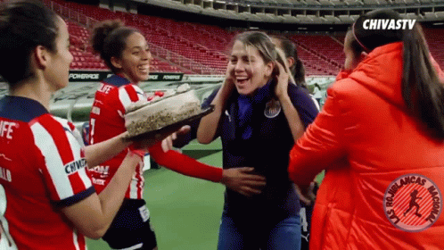 Female Soccer Players Celebrating Win