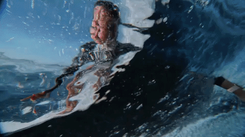 Female Surfer Wearing Apple Watch GIF