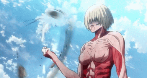 Female Titan Standing In Cloudy Sky GIF
