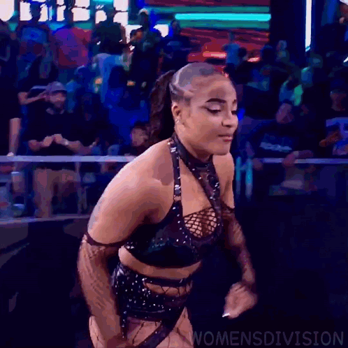 Female Wrestler Dancing in Black Outfit