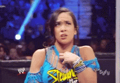 Female Wrestler Wearing Shawn Blue Shirt
