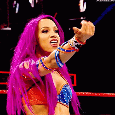 Female Wrestler With Pink Hair Giving Middle Finger GIF