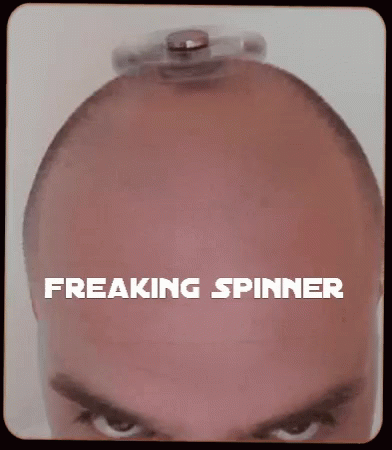 Fidget Spinner On The Top Of Bald Head GIF