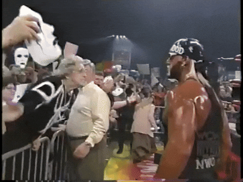 Fierce Granny Fighting Off Wrestler GIF