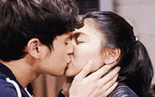 Fiery Romance Sizzling Kissing GIF