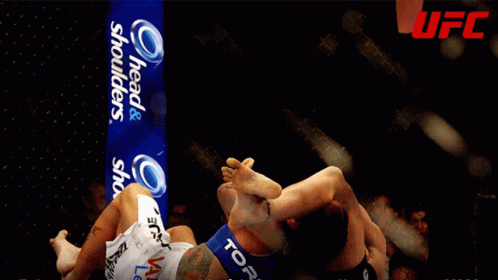 Fighter Being Pinched by Referee