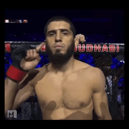 Fighter In Front Of Judhabi Sign GIF