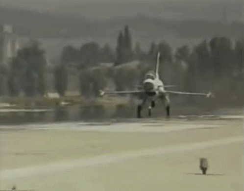 Fighter Jet Taking Off From Runway in Fog