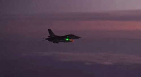 Fighter Jet With Green Nose Light GIF