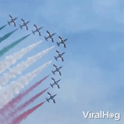 Fighter Jets Flying In Formation With Red White And Green Smoke GIF