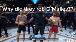 Fighters in Ring Saying Why Did They Rob O'Malley