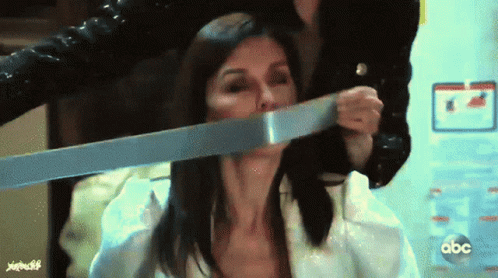 Finola Hughes Being Gagged With Duct Tape GIF