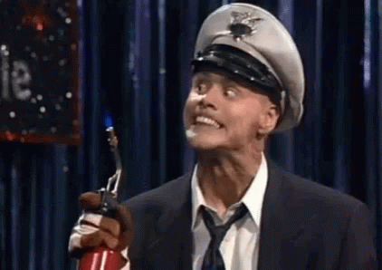 Fire Marshall Bill Holding Torch GIF