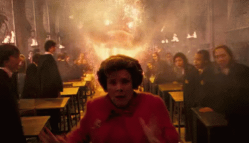 Fire Spirit Chasing Dolores Umbridge GIF